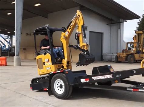 what size trailer to haul a mini excavator|unloading mini excavator on trailer.